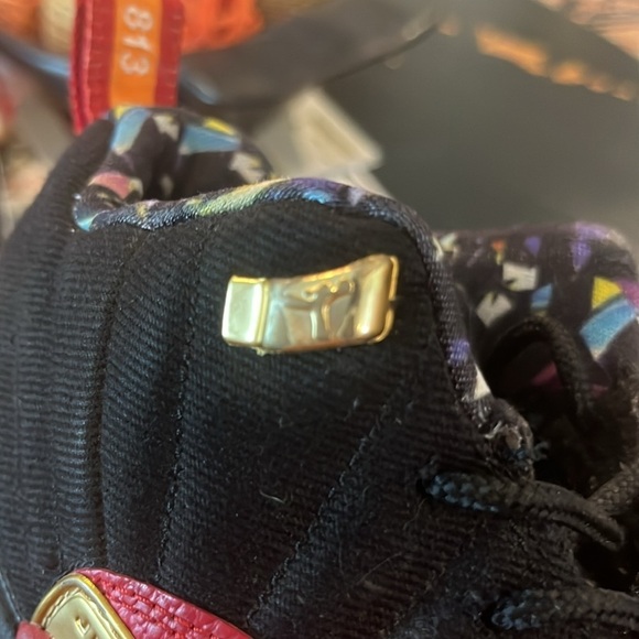 Jordan Athletic Shoes in Black and Red with Gold Highlights